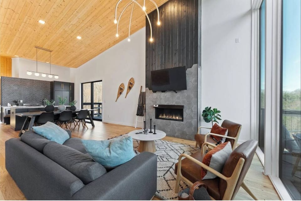 Upon entering the cabin, you will find a spacious living room and kitchen.
