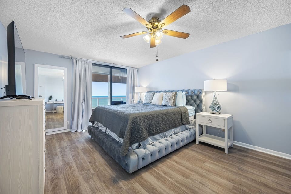 Comfortable master bedroom with a comfy king bed
