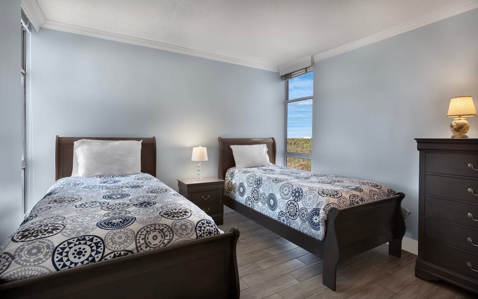 Third Bedroom - Third bedroom with two twin beds, suitable for children or additional guests.