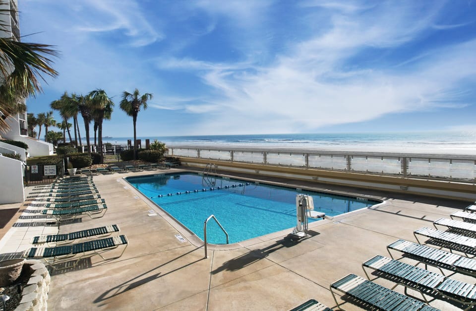 Outdoor Oceanfront Pool - Outdoor pool located on the property with views of the ocean and space for swimming or relaxing.