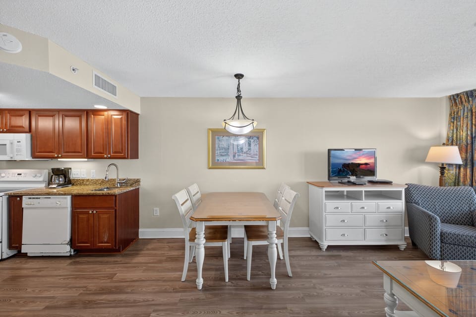 Dining Area - Enjoy family dinners or quick breakfasts together in this inviting dining area just off the kitchen.