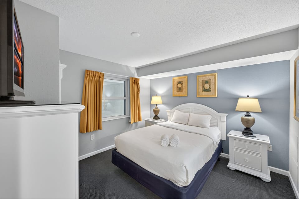 Bedroom 2 - Spacious second bedroom with comfortable beds — perfect for kids, guests, or additional family members.