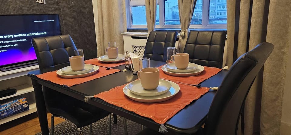 Living Room , Dining Table and chairs + Smart TV