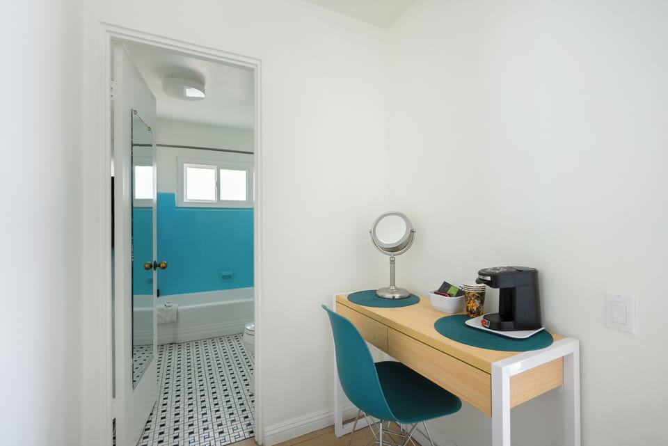 Vanity and bathroom.