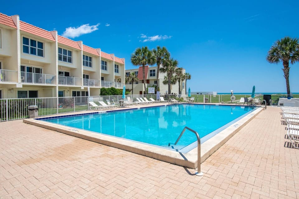 Lounge by the pool with your favorite book and cool off in the crystal clear water.