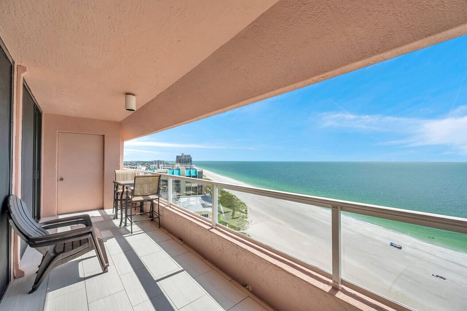 Sip morning coffee on the spacious balcony overlooking endless ocean blues.