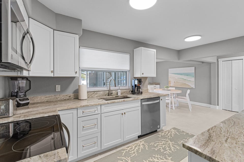 kitchen with granite countertops and stainless steel appliances