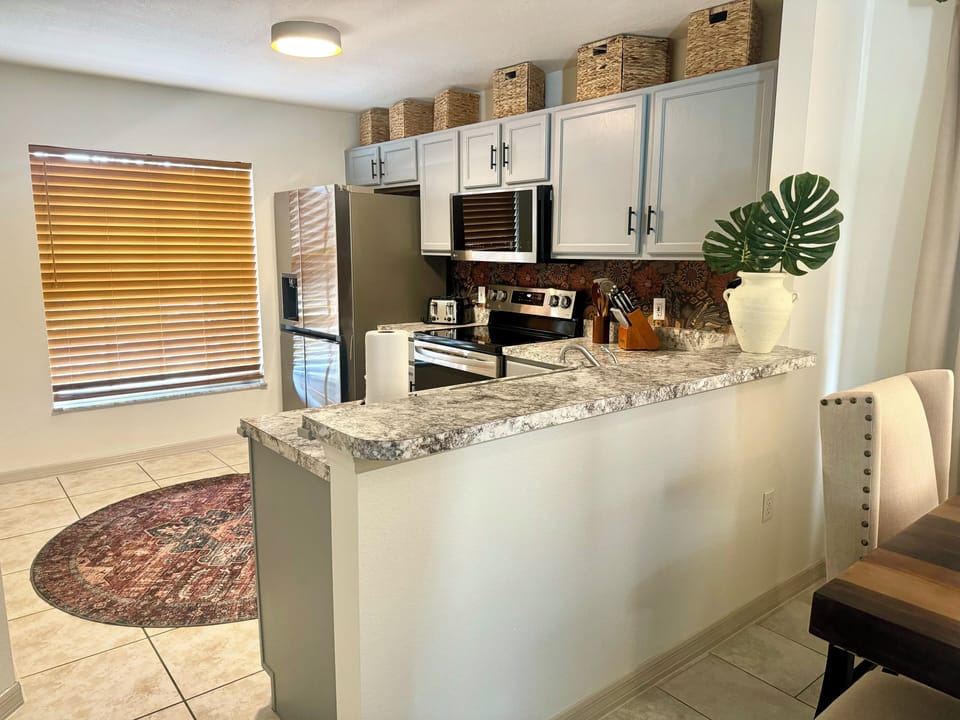Open plan kitchen with brand new upgraded appliances