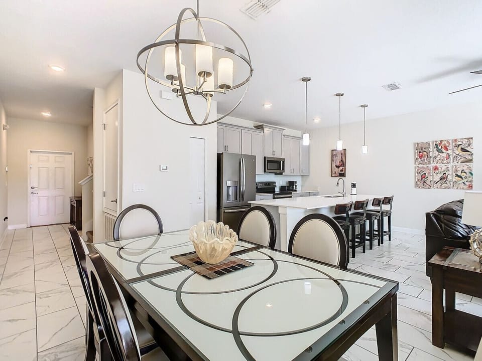 Gather & feast in this stylish dining room with open-plan kitchen.
