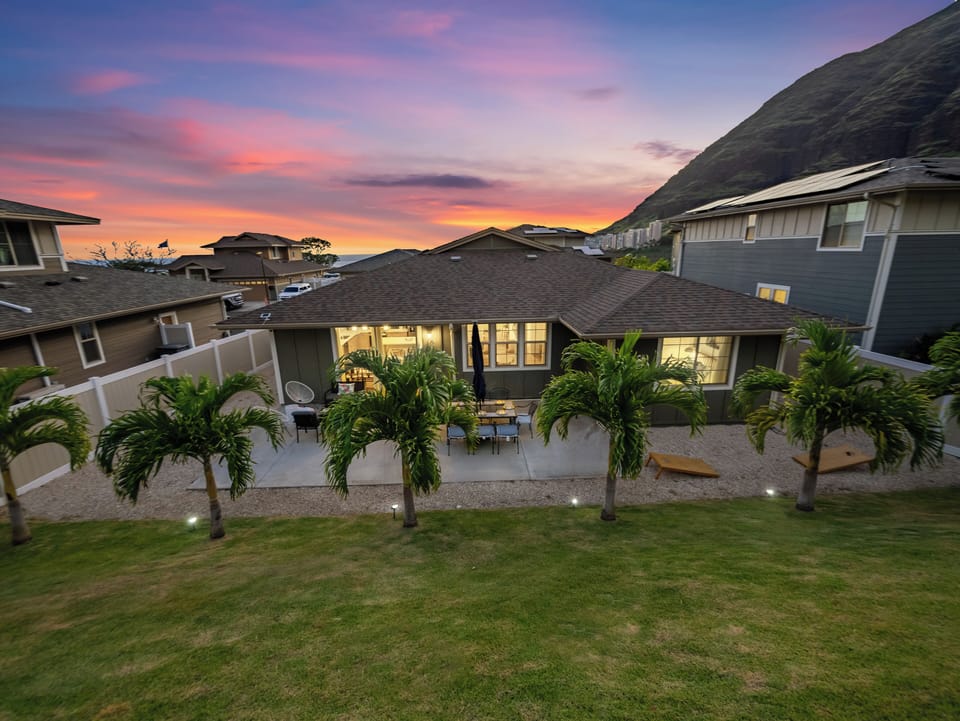 Private backyard with palms and sunset views!