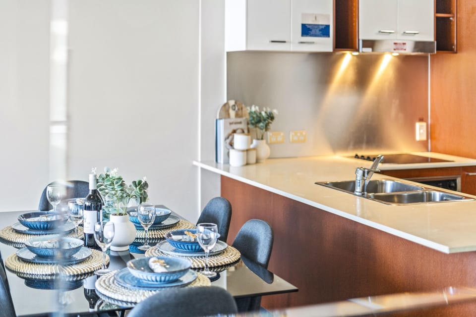 Dining area is right next to the fully equipped modern kitchen