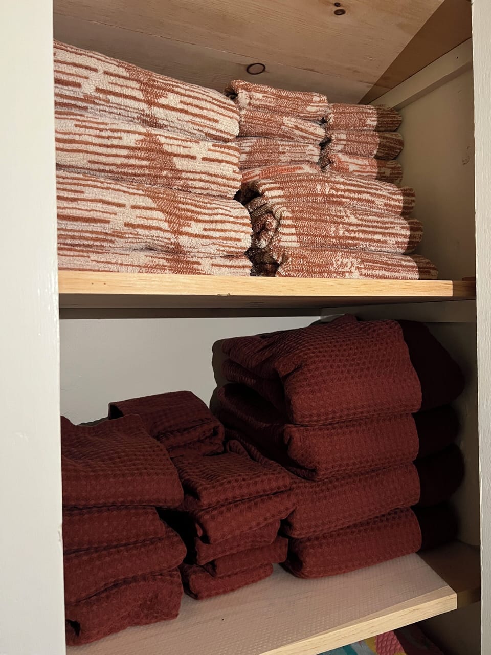 Upstairs closet with linens