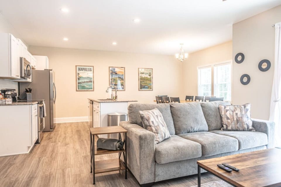 Living room comfortably located in the heart of the home.