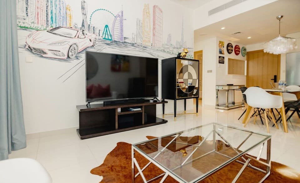 A vibrant living room featuring unique wall art, a modern coffee table, and a comfortable couch.