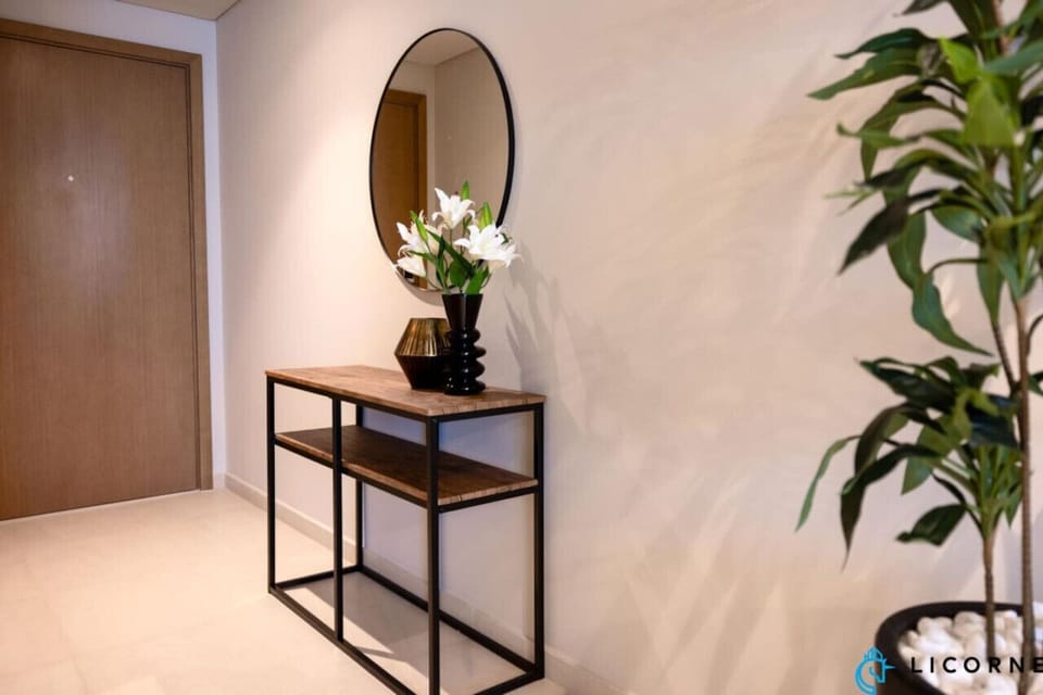 Soft lighting and a warm color palette create an inviting atmosphere as soon as you step inside.