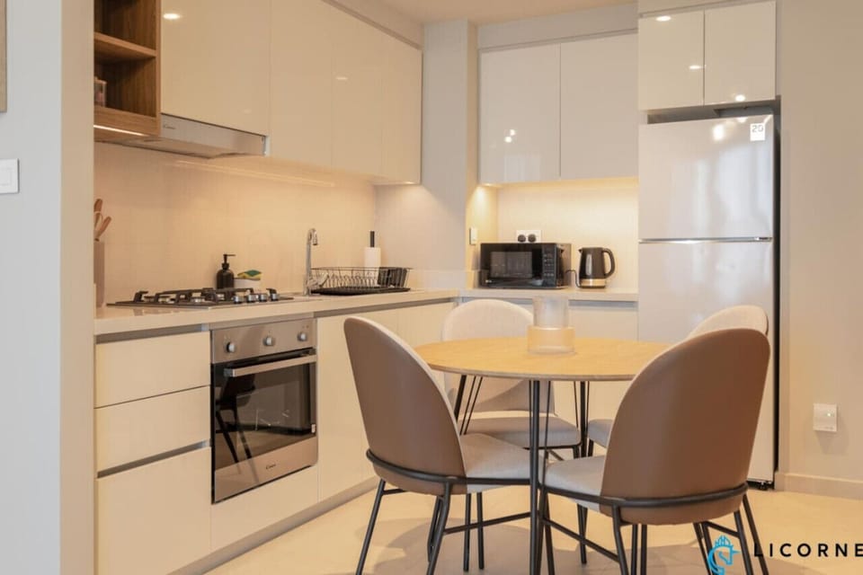 The fully equipped kitchen features modern appliances and ample counter space, making meal preparation a breeze.