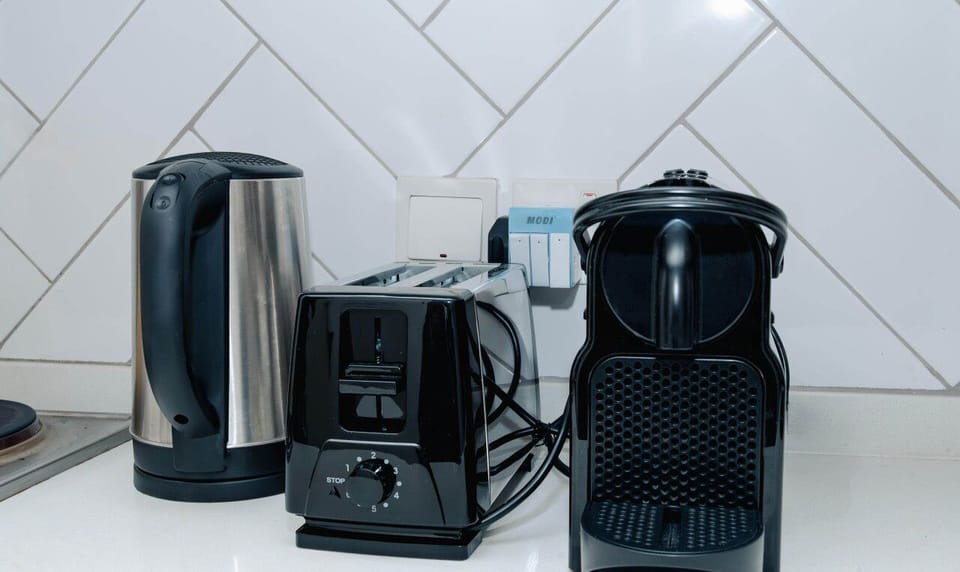 Start your day right with a kettle, espresso machine, and toaster – perfect for morning coffee and breakfast.