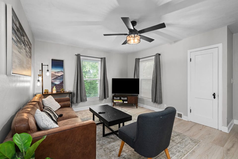 Walk in to the newly renovated living area featuring: plush 3-seater couch, remote fan control, Smart TV with live cable, books, board games and more!