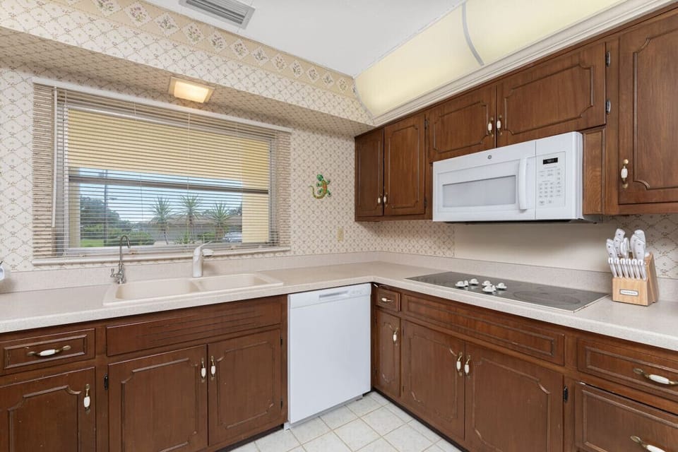 Kitchen has Large Appliances Including a Dishwasher