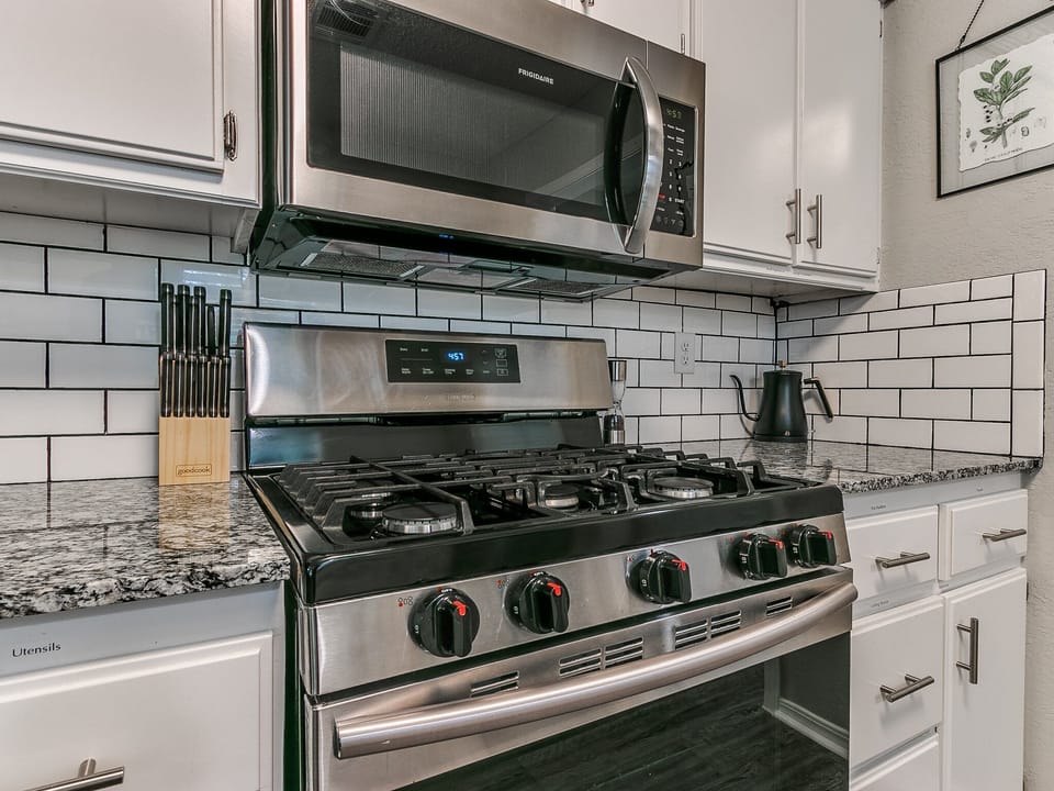 Gas stove and oven with microwave and kettle