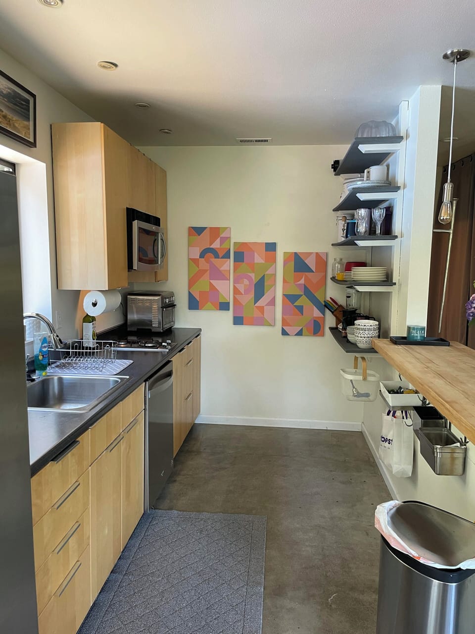 Kitchenette.  Most people do fine with the large toaster oven and gas stovetop.