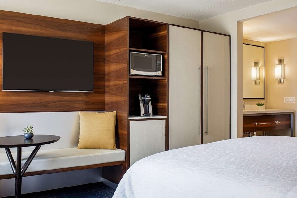 Settle in with a big TV and streamlined storage wall.
