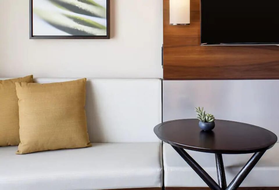 Lounge comfortably with a cozy banquette and intimate bistro table.