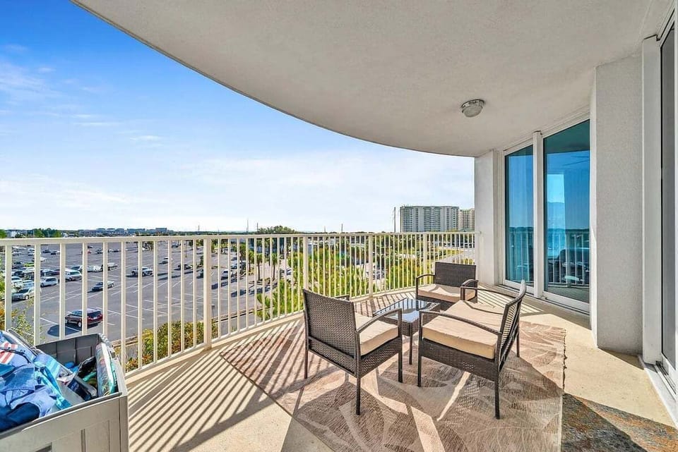 Balcony connected to unit with comfortable seating for 3