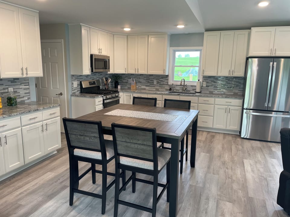 Kitchen area with dining table for 6