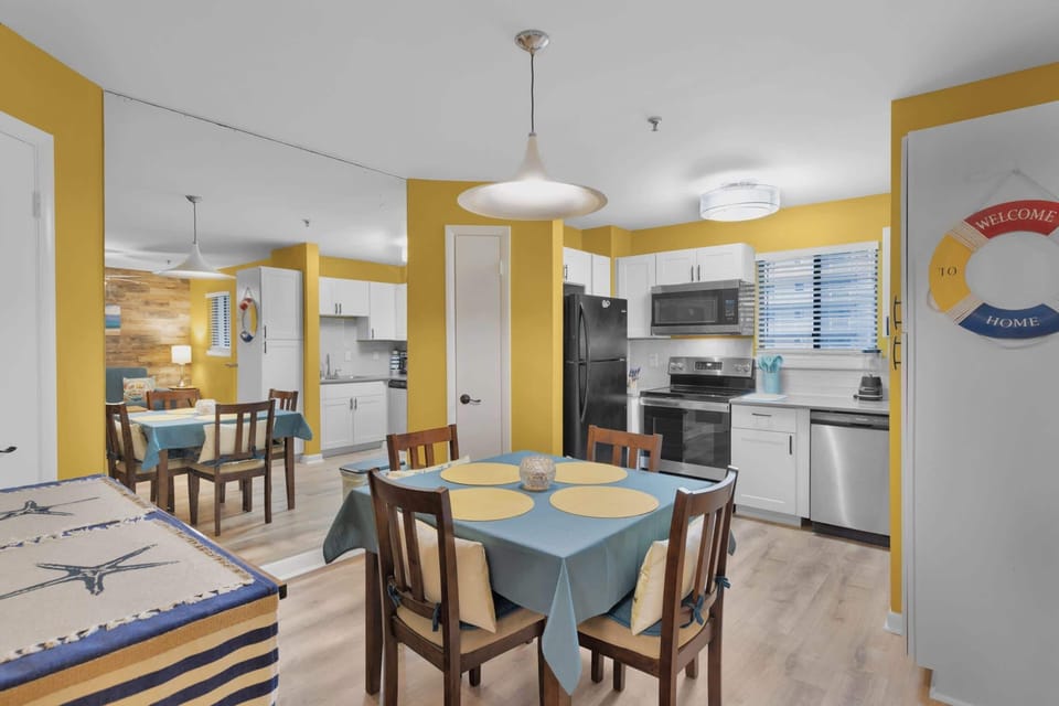 Enjoy meals together at the dining table with seating for 4