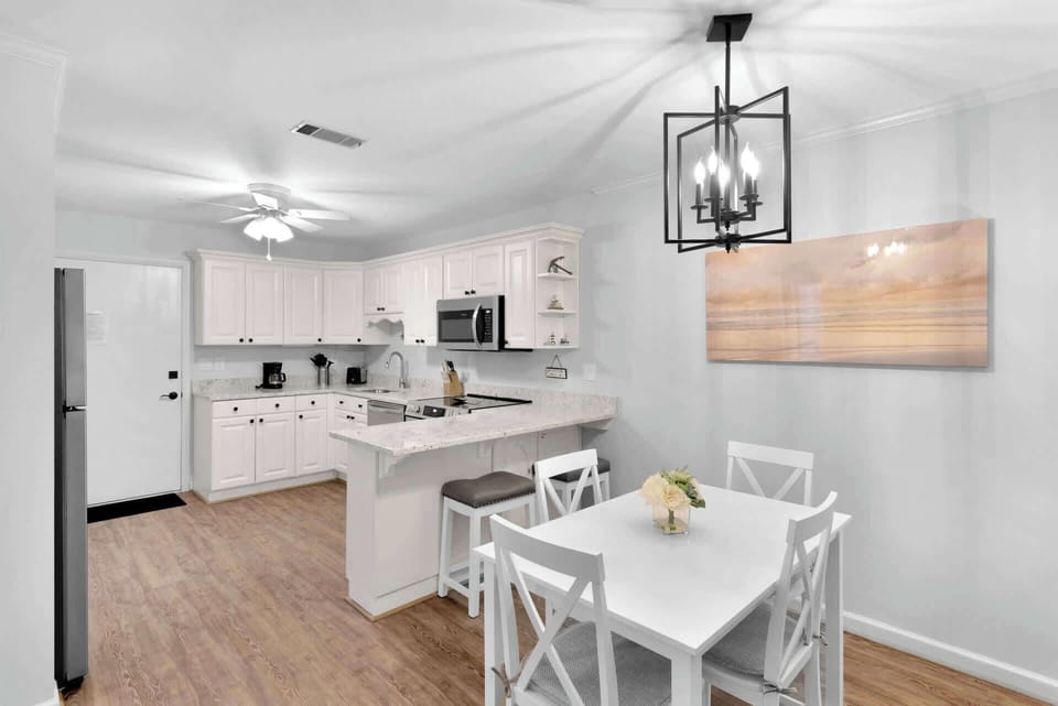 Gather for meals together at the dining table, with seating for 4