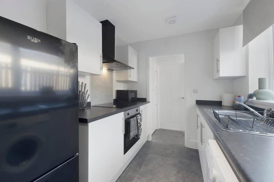 Family-friendly kitchen oasis equipped with all essentials, including a washer & dryer, oven, fridge and full cookware set. Plus, thoughtful touches like children's dinnerware ensure everyone feels right at home in this cozy culinary haven.