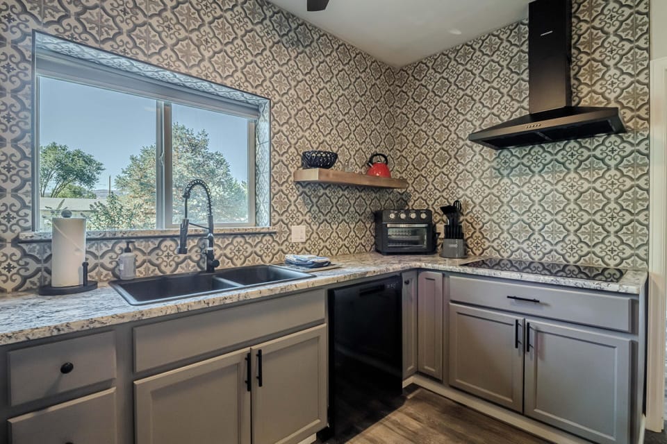 It doesn't matter if you're cooking together or sharing stories over coffee, this kitchen is made for connection.