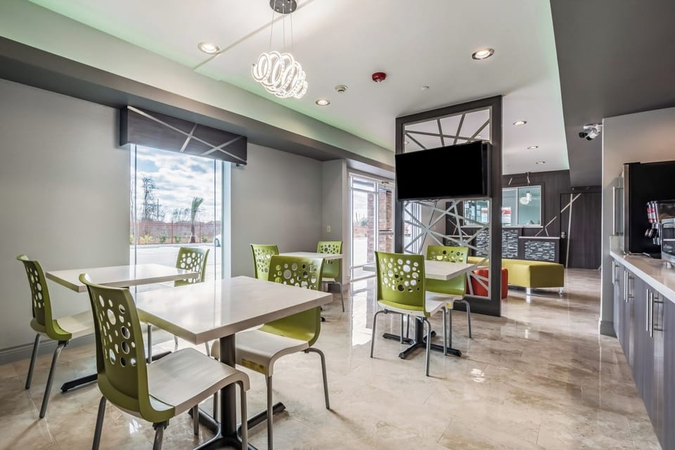 Gather for breakfast with bright views and comfortable seating.