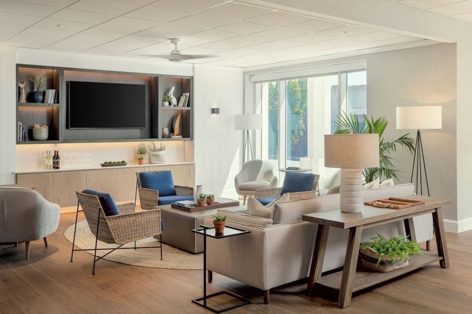 Settle in for relaxed conversation in this bright, stylish lounge