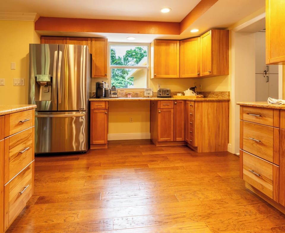 Kitchen. There refrigerator has two ice makers. 
