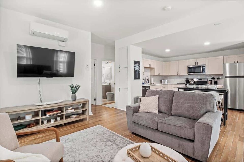 55" TV screen. Sprawl out on these comfy couches.