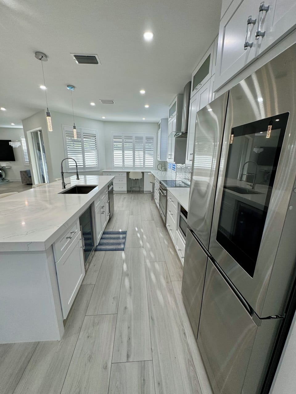 Samsung fridge and dishwasher, Italian stove, beer/wine fridge and microwave