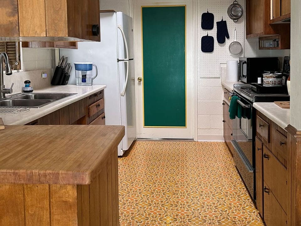 Kitchen. Door leads to the Laundry Room Washer & Dryer