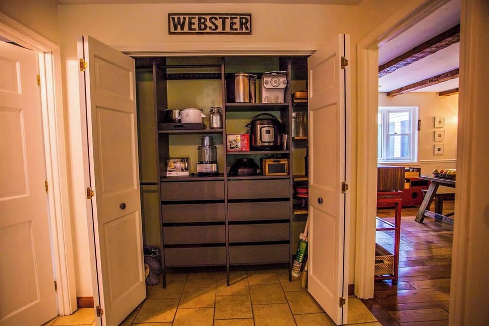 Pantry in mudroom, stocked with appliances and supplies