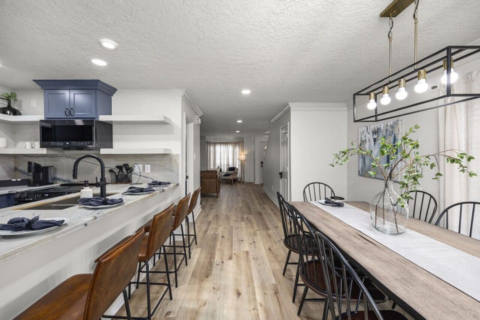 The dining room and bar seating at the kitchen provide ample space for your group