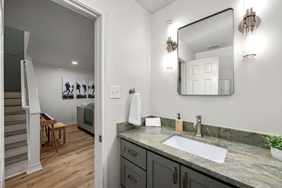 Half Bathroom downstairs is nicely decorated and upgraded