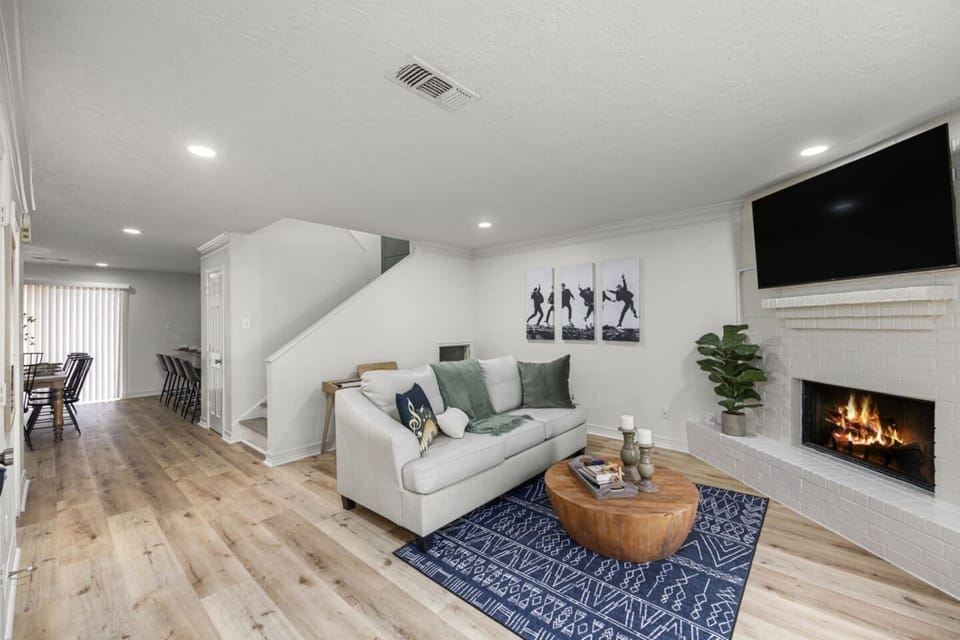 Unit 603 Cozy living room with fireplace and Smart TV