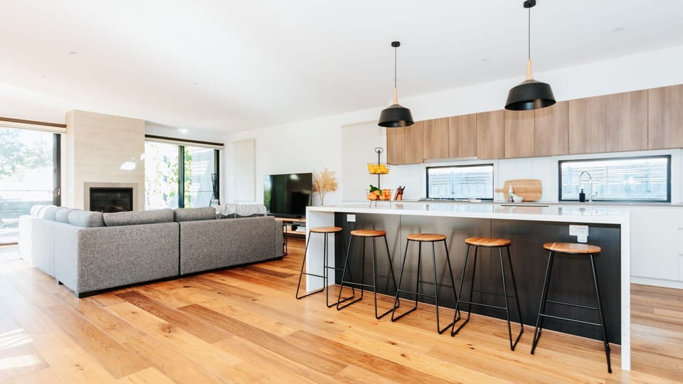 Rear - Open Living - Gas Fireplace, Reversible Cooling- Heating System available.