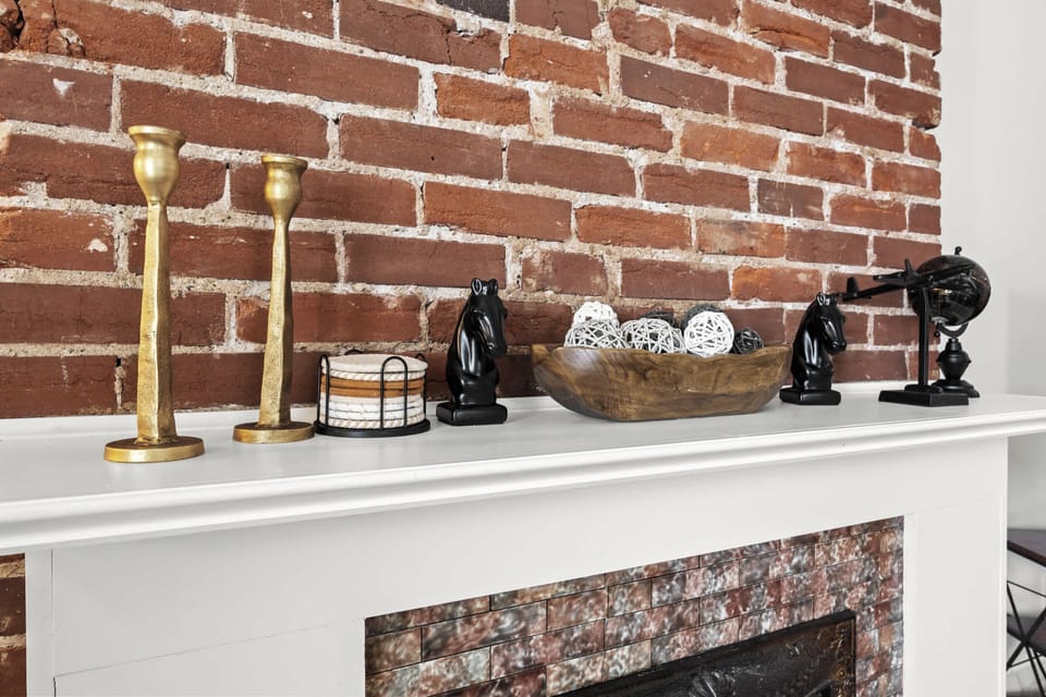 Living Room 1: Where modern comfort meets curated style—unwind in the heart of it all.