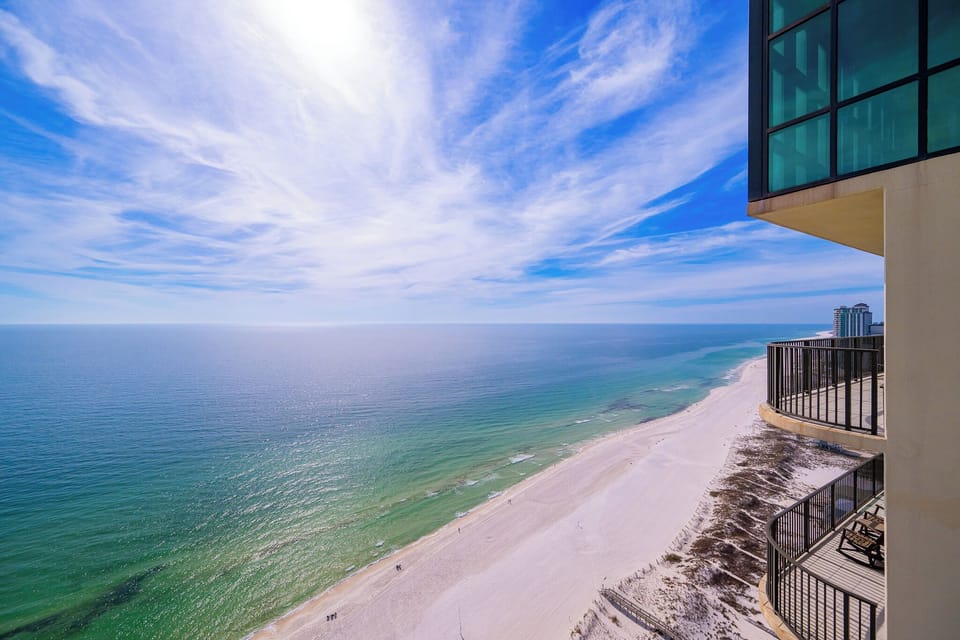 Gaze at the stunning coast from your balcony, enjoying the tranquility and captivating views