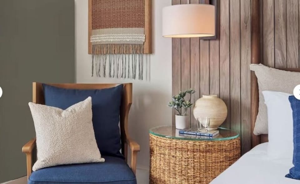 Unwind with a good book in this cozy reading corner.