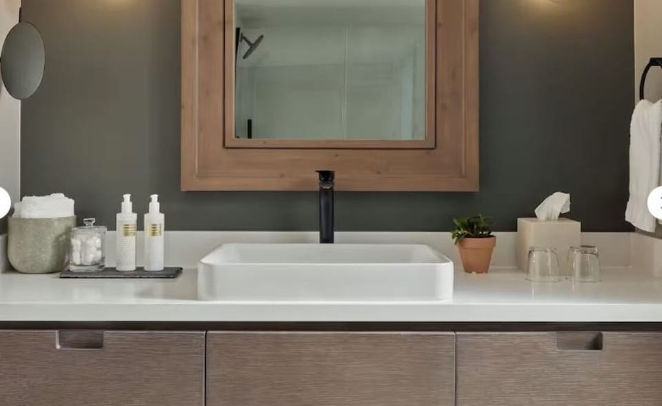 Refresh at the modern vanity with spa-like, clean finishes.