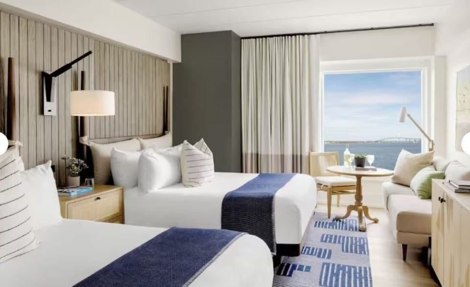 Stretch out in a bright room with bayfront seating.