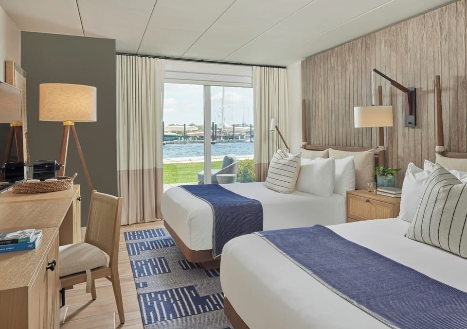 Spread out in two plush beds with patio-side views.
